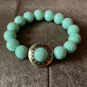 Mint green bead bracelet with accent design, hardly worn
